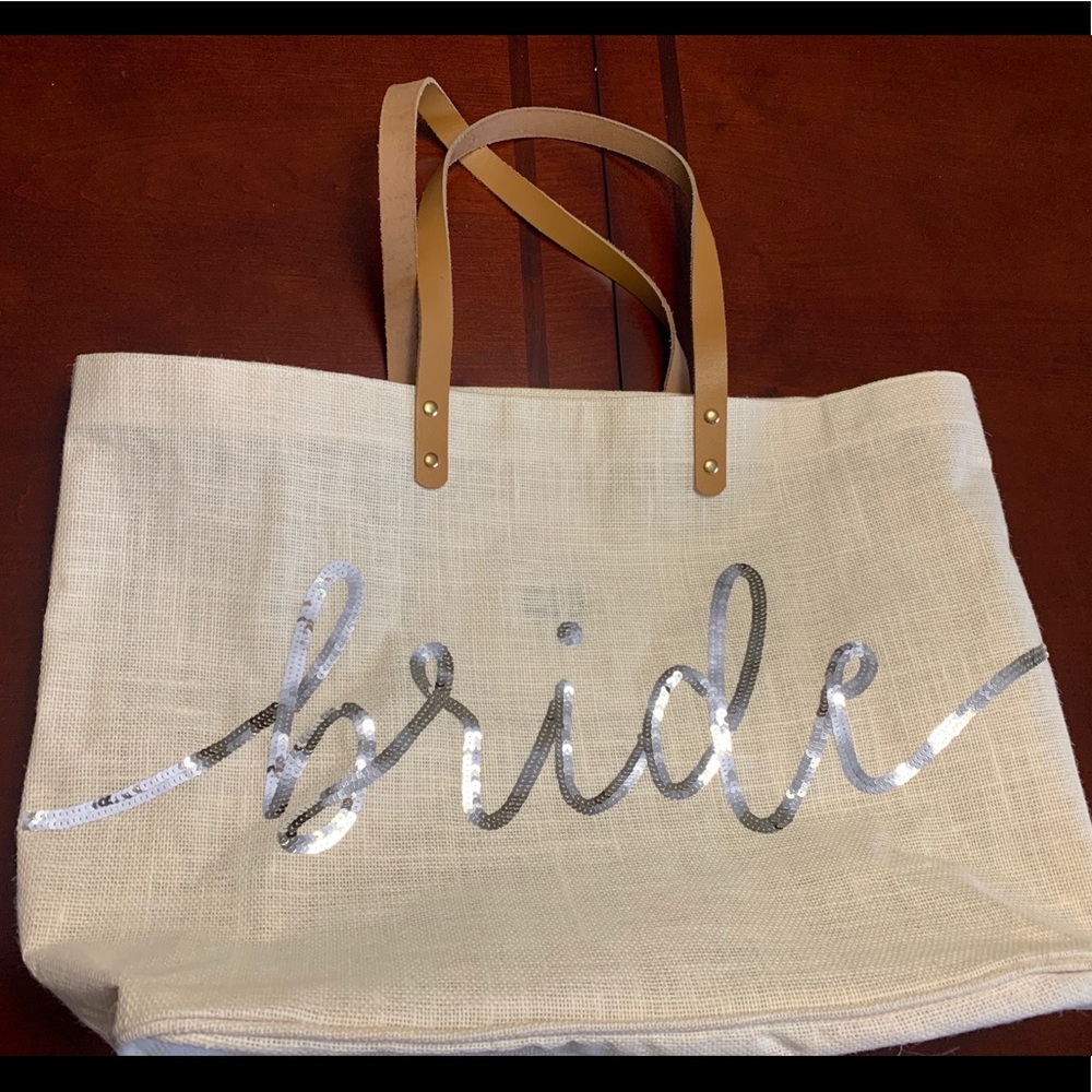 White tote w/ silver sequined “bride” on the front